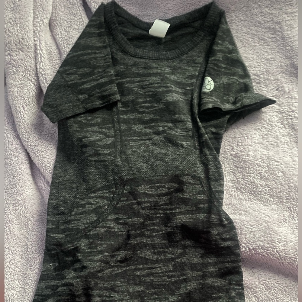 Two TKEQ ridding shirts